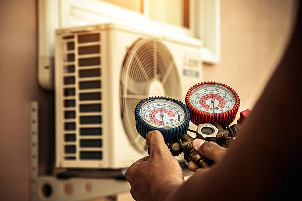 Professional Air Conditioning Service technician working in Primm Springs, TN